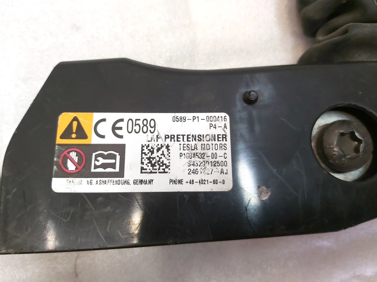 1 OUTBOARD LAP PRETEN, LH BLK for restoration Tesla model S 1004532-00-B