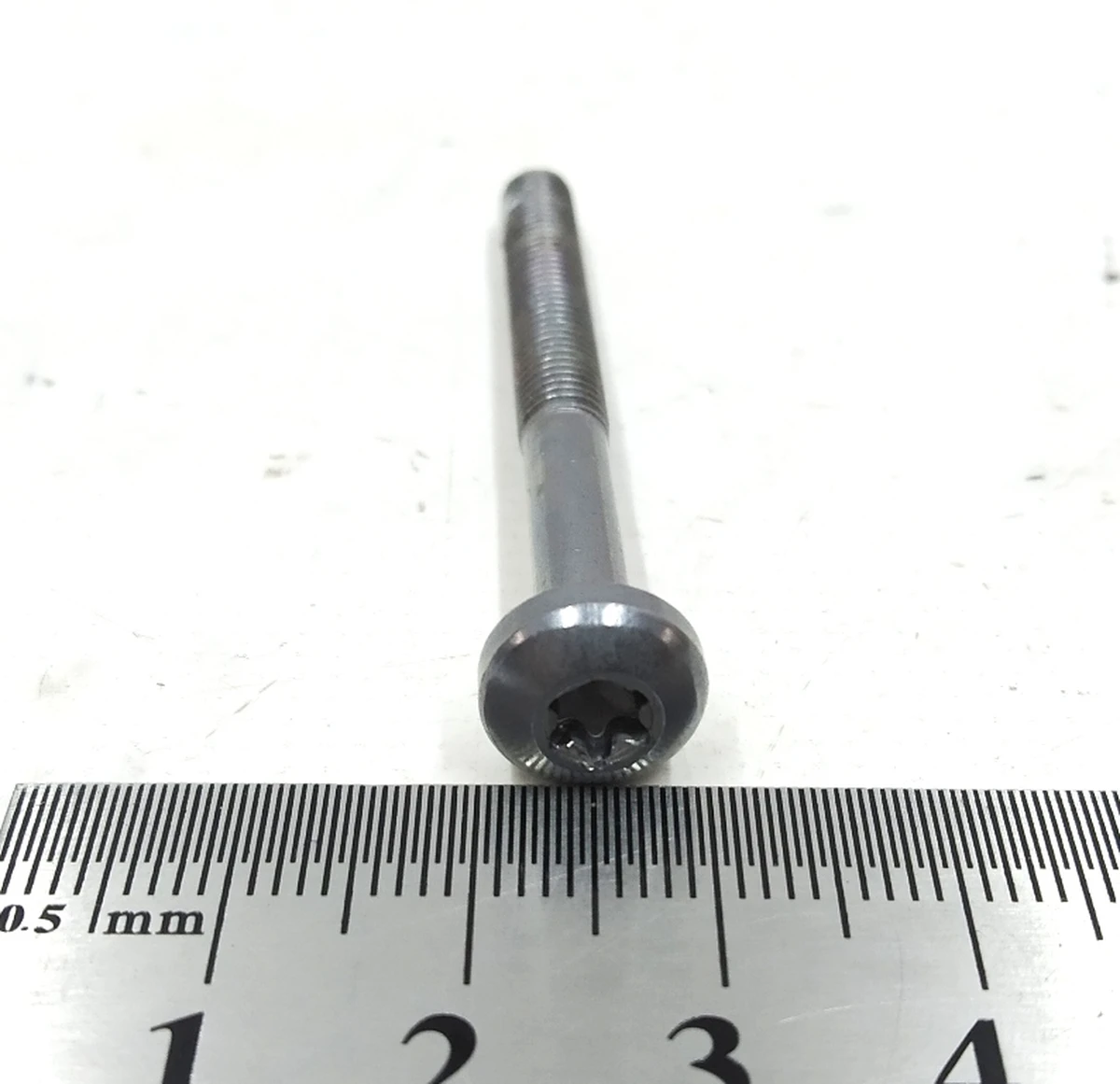 Болт M5x0.8x50MM, T25 BUTTONHEAD Tesla model S 1008289-00-B