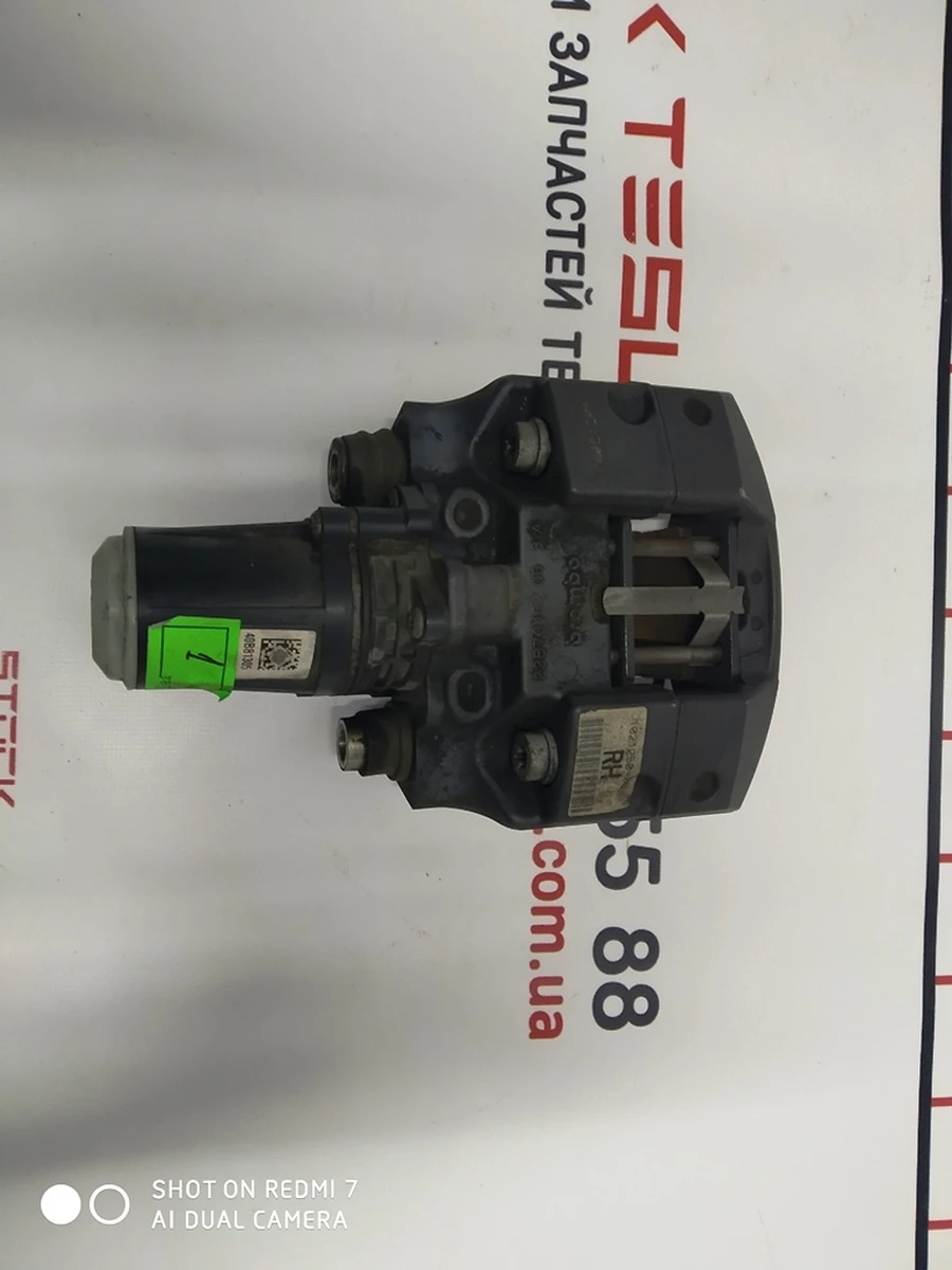 1 Супорт гальма стоянки правий в зборі Tesla model XS REST 1021250-00-F