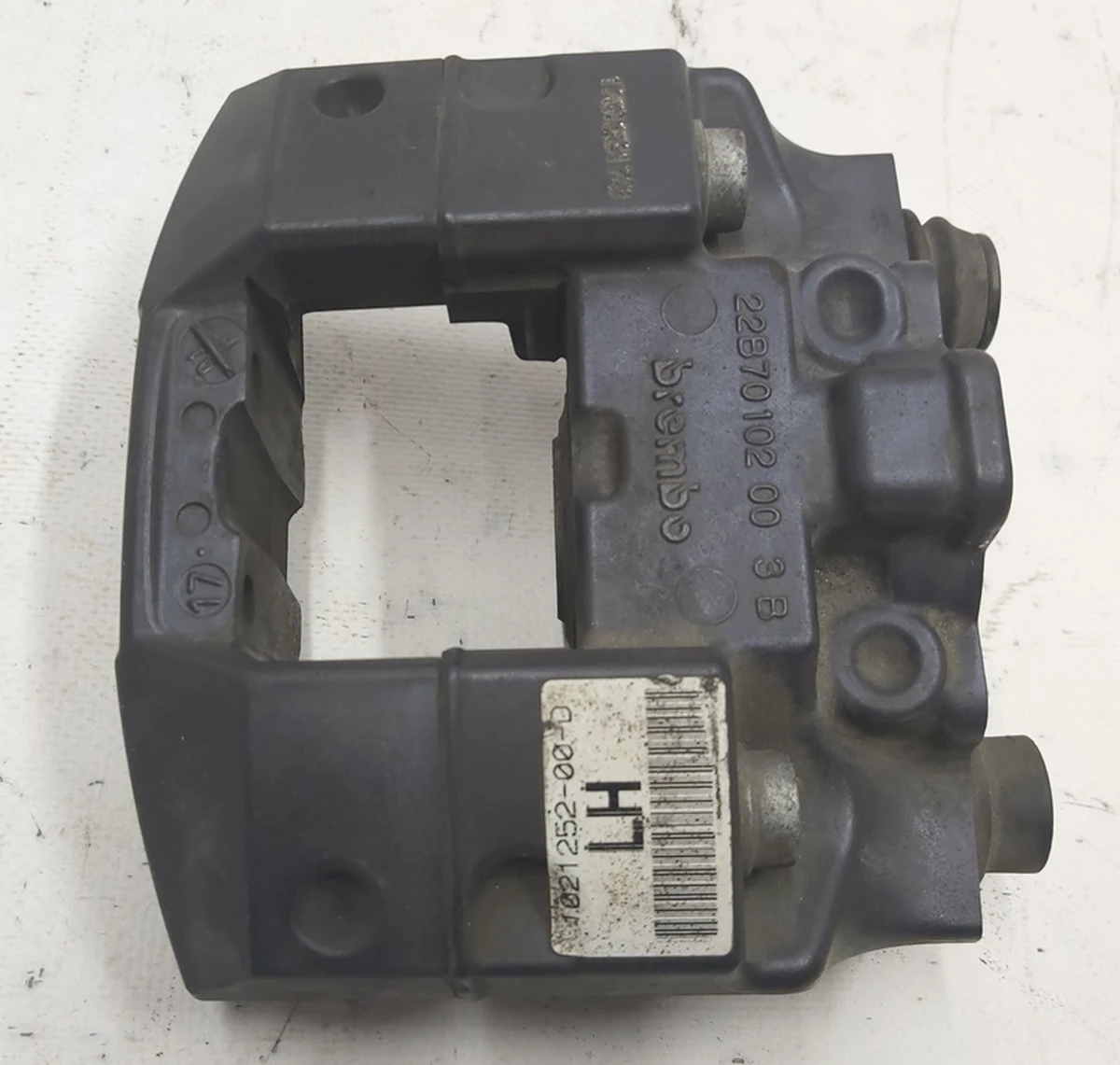 1 Супорт стоянкового гальма лівий BREMBO (без двигуна, без колодок, штифтів) Tesla Model S, Model S REST, Model X 1021252-00-F