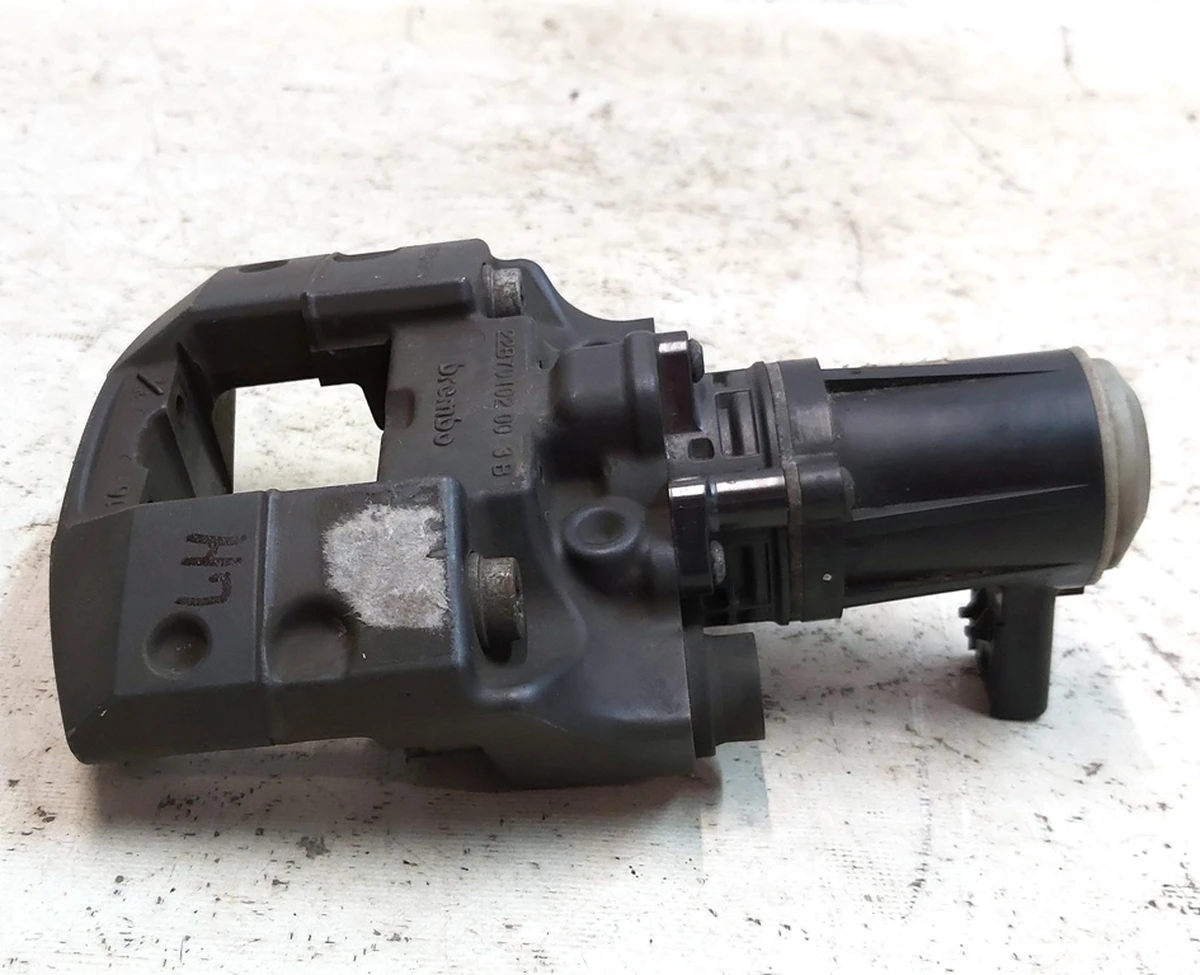 1 Супорт стоянкового гальма лівий BREMBO без колодок Tesla Model S, Model S REST, Model X 1021252-00-F