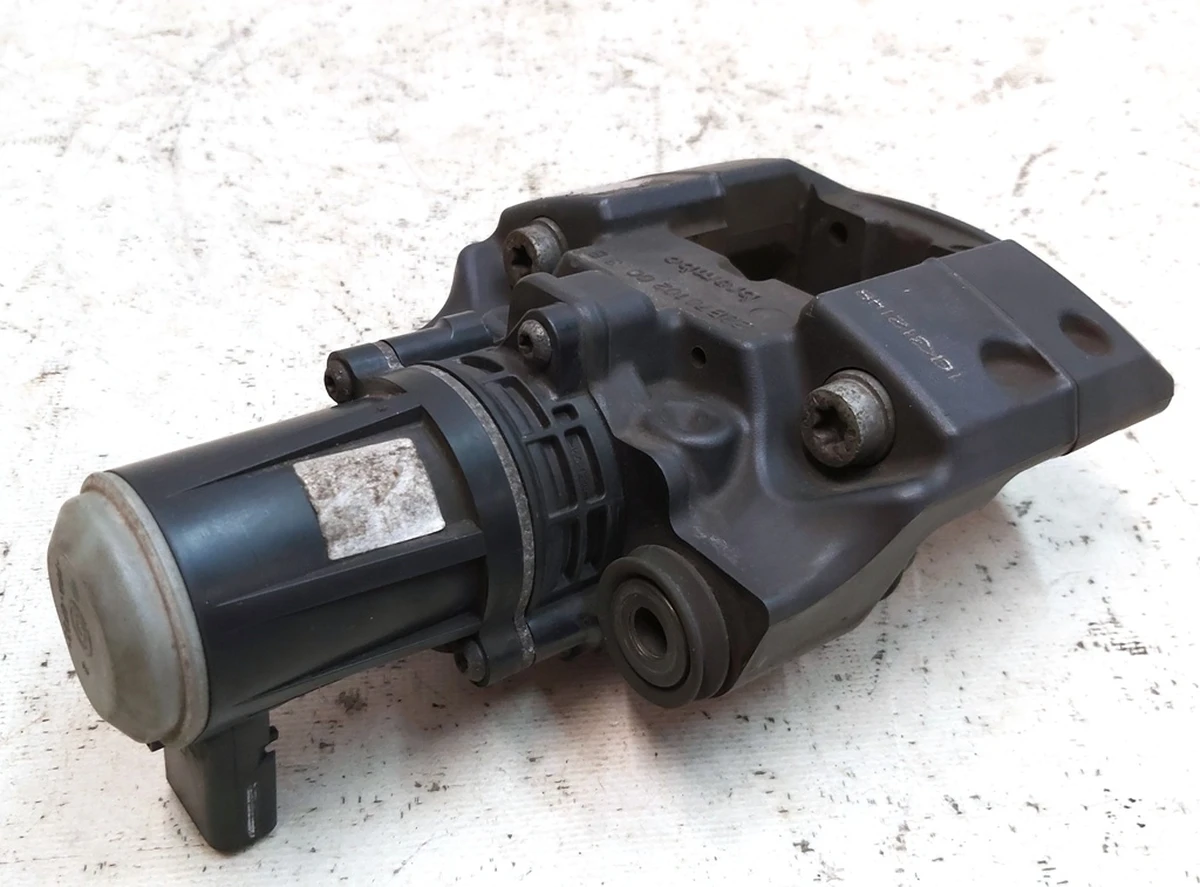 1 Супорт стоянкового гальма лівий BREMBO без колодок Tesla Model S, Model S REST, Model X 1021252-00-F