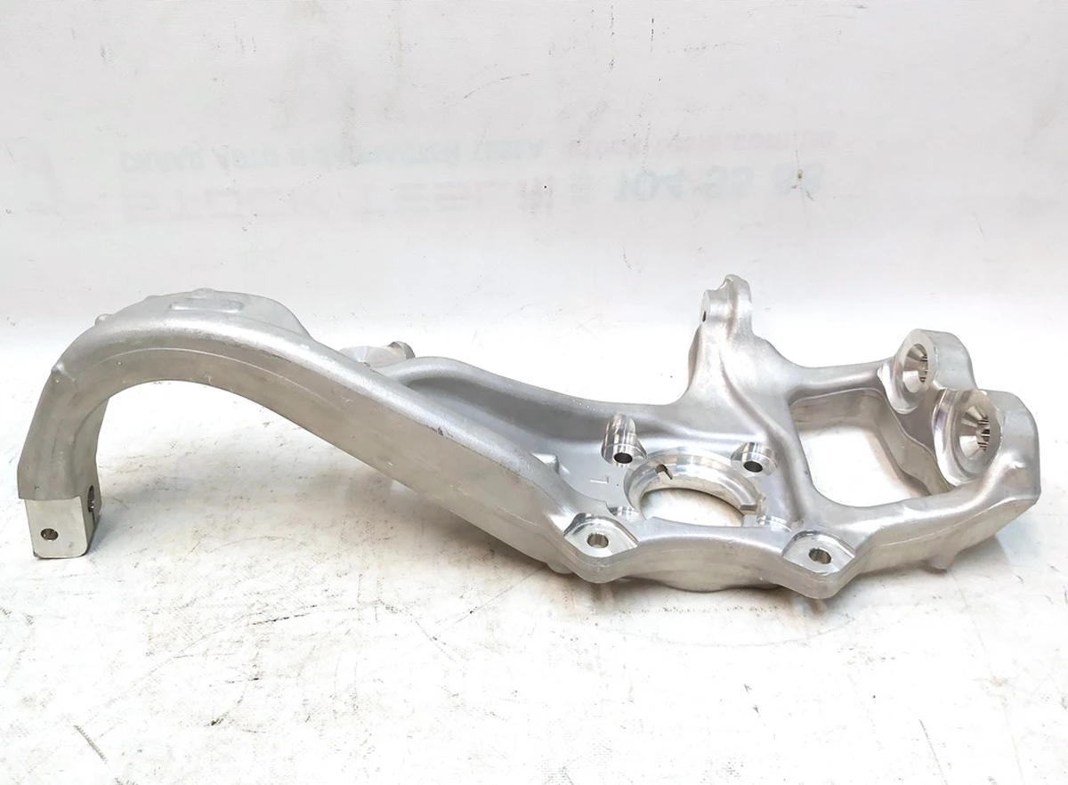 1 Кулак поворотный передний левый Tesla model X 1027311-00-F