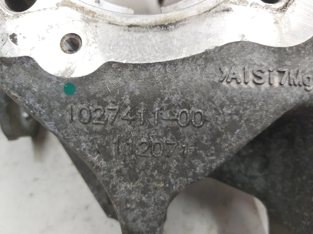 1 Left rear knuckle (trunnion) with damage Tesla model X 1027411-00-D