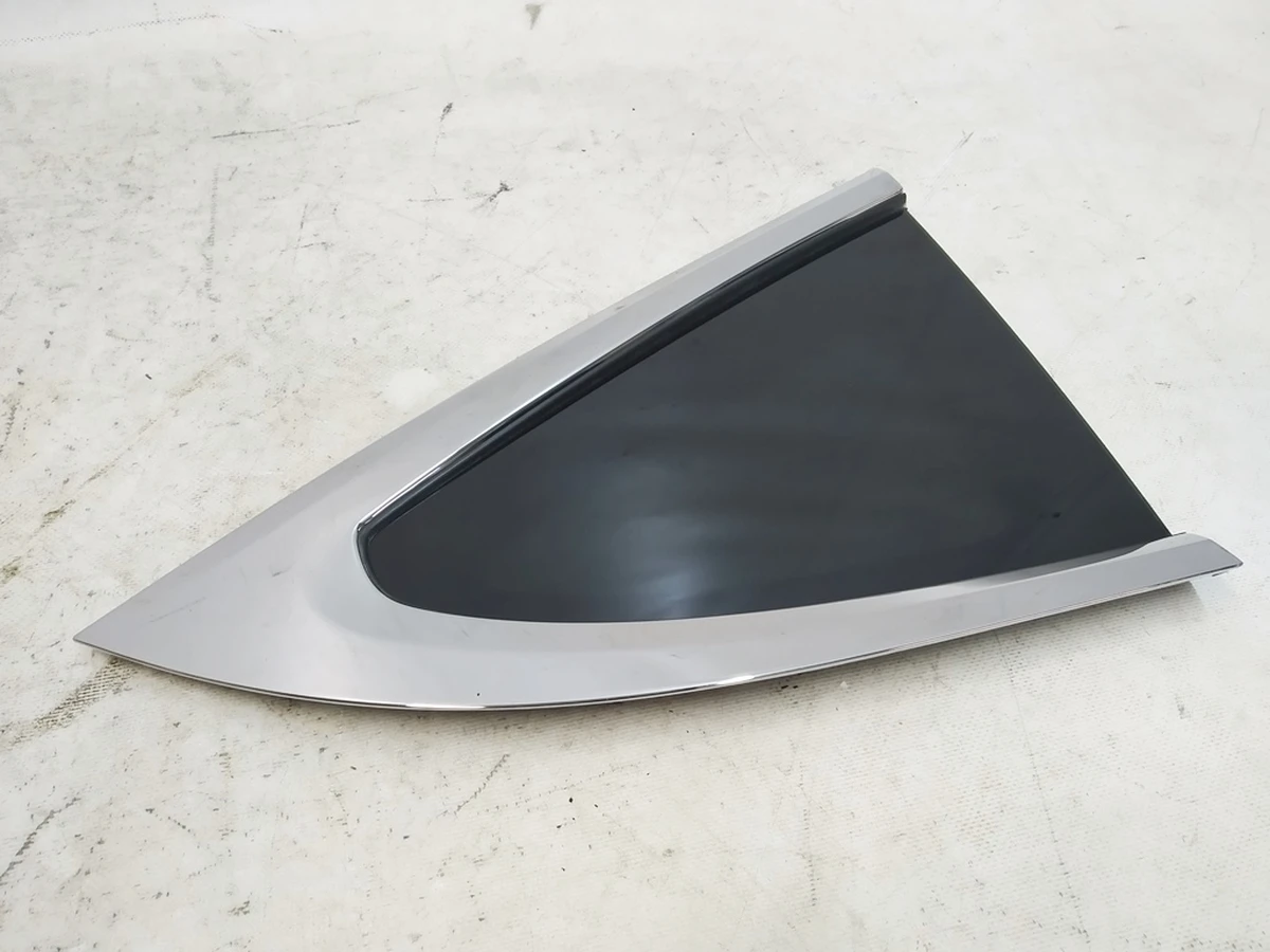 15 Стекло крыла заднего левого (форточка) с молдингом хром в сборе Tesla Model X 1034906-00-I