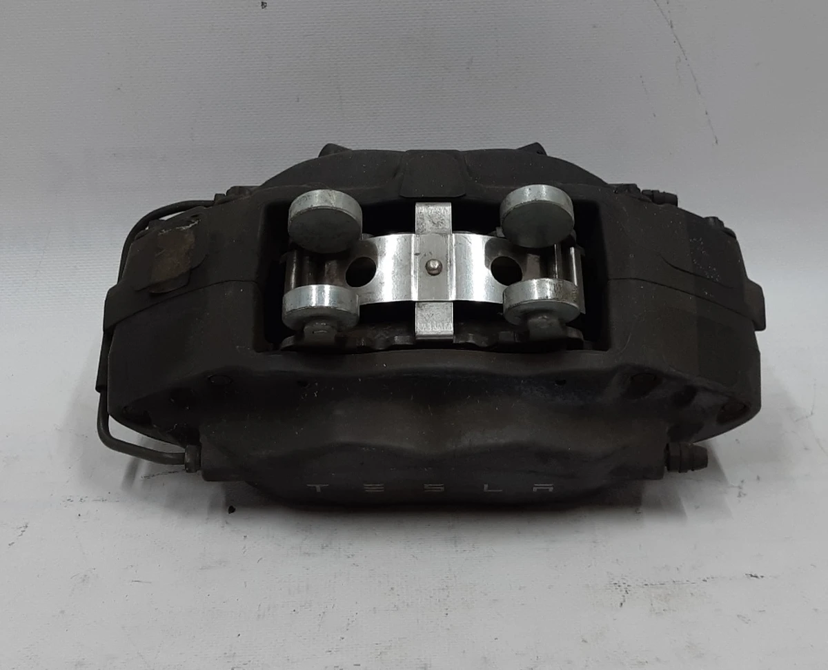 1 Суппорт тормозной передний правый (WITH PADS BLACK) с механическим контроллером износа тормозных колодок Tesla model S 1042640-00-F