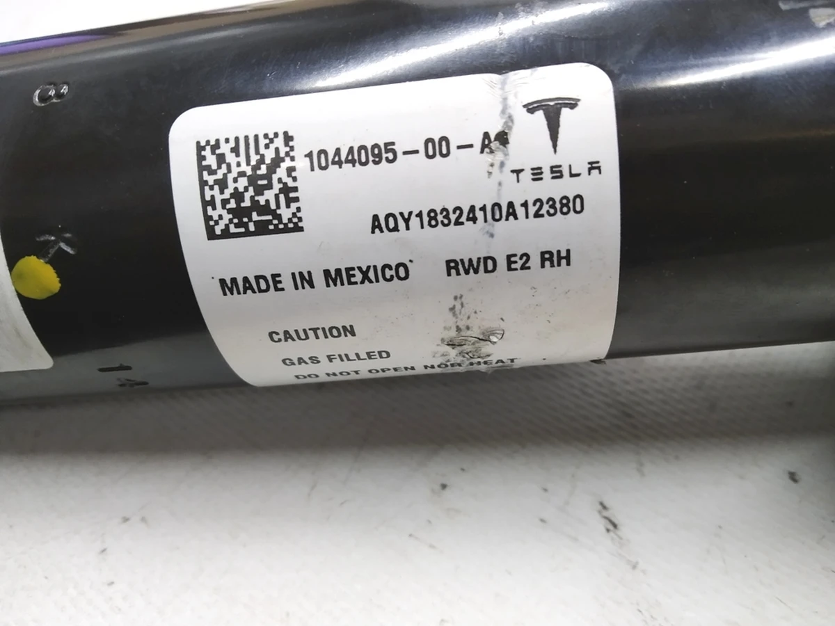 1 Амортизатор передний правый (пружинный) Tesla model 3 1044095-00-A