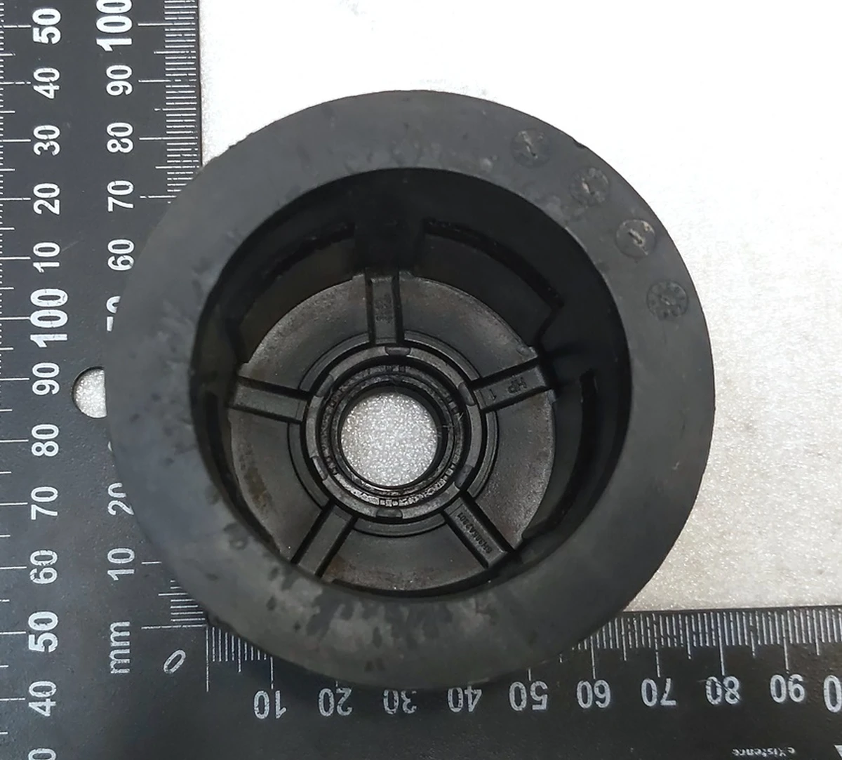 1 Shock absorber dust boot cup (plastic) front Tesla Model 3 1044461-01-E