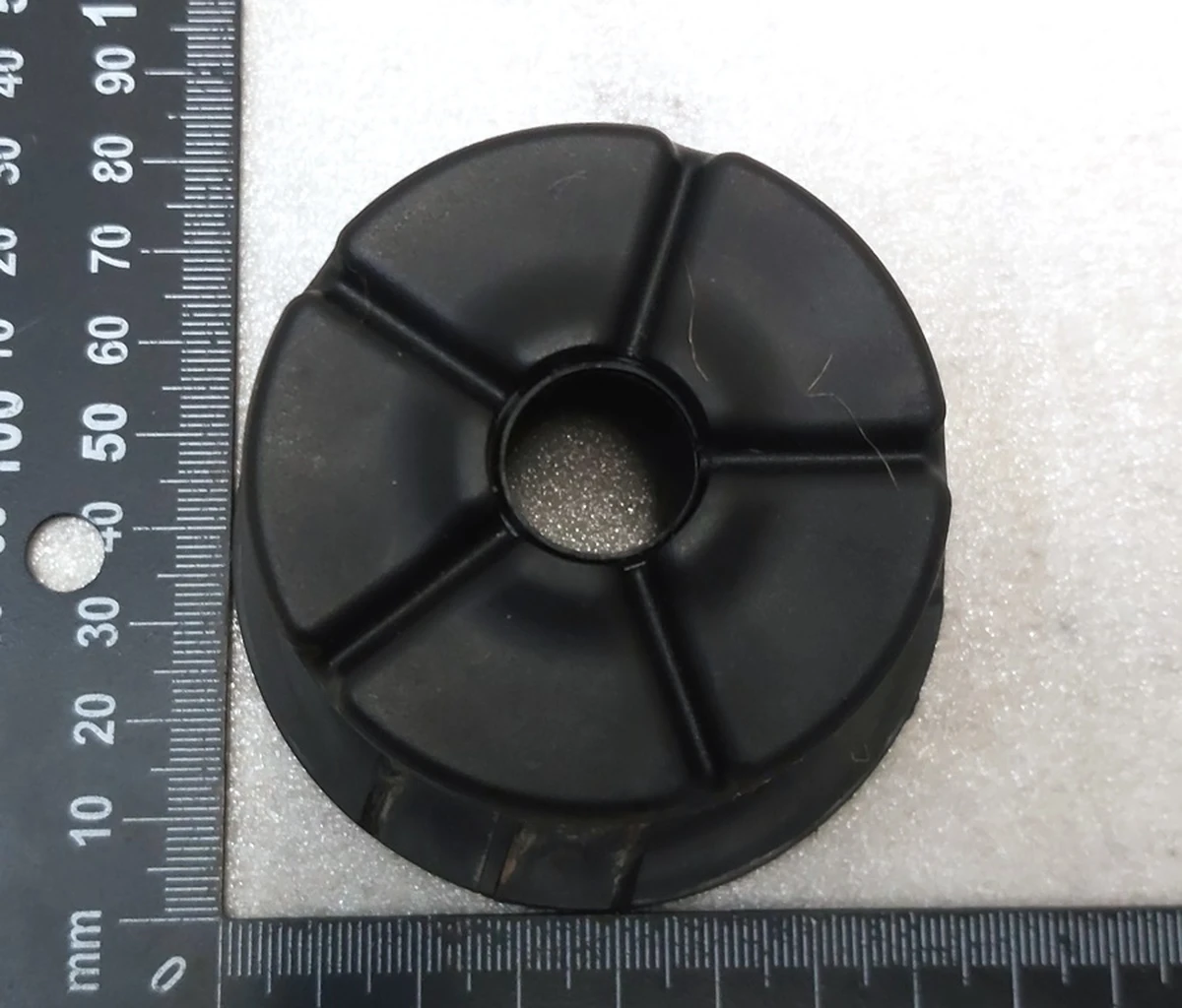 1 Shock absorber dust boot cup (plastic) front Tesla Model 3 1044461-01-E