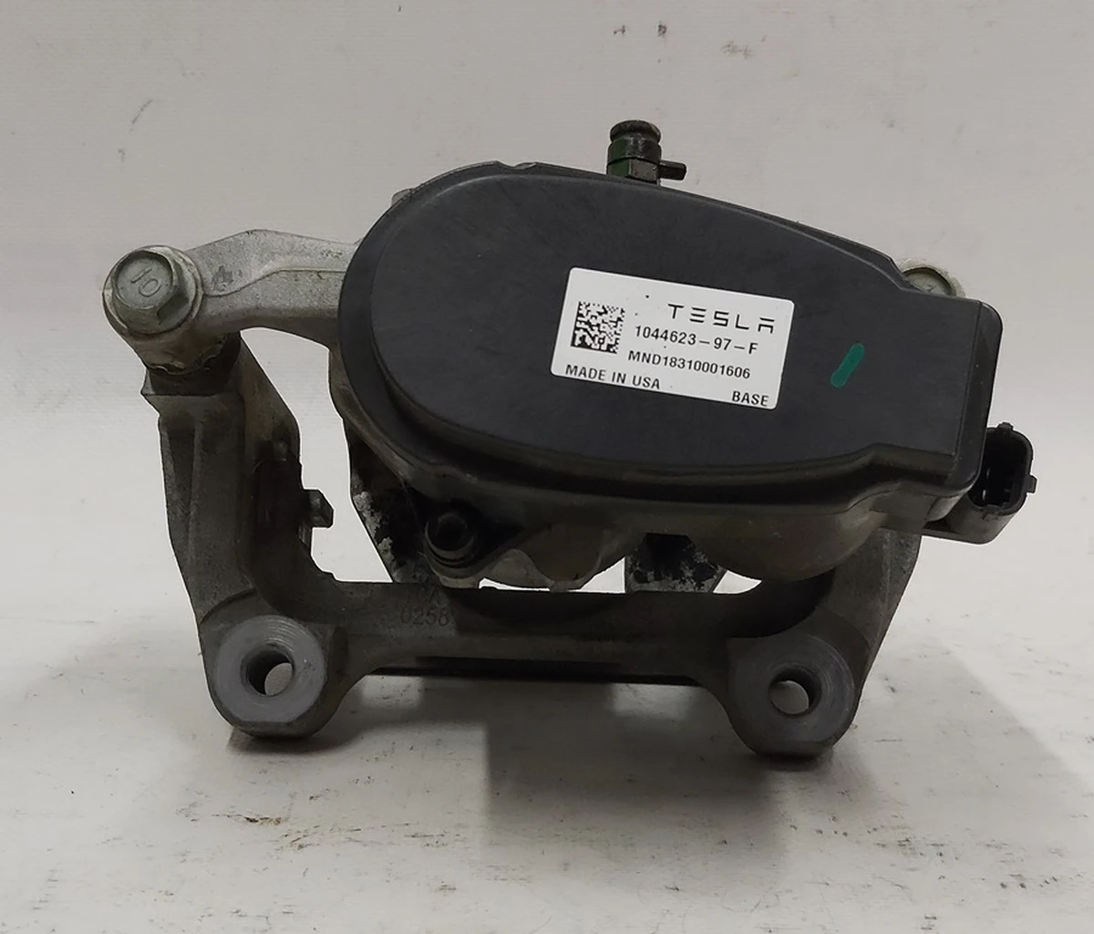 5 Суппорт тормозной задний левый MANDO без тормозных колодок Tesla model 3 1044623-00-H