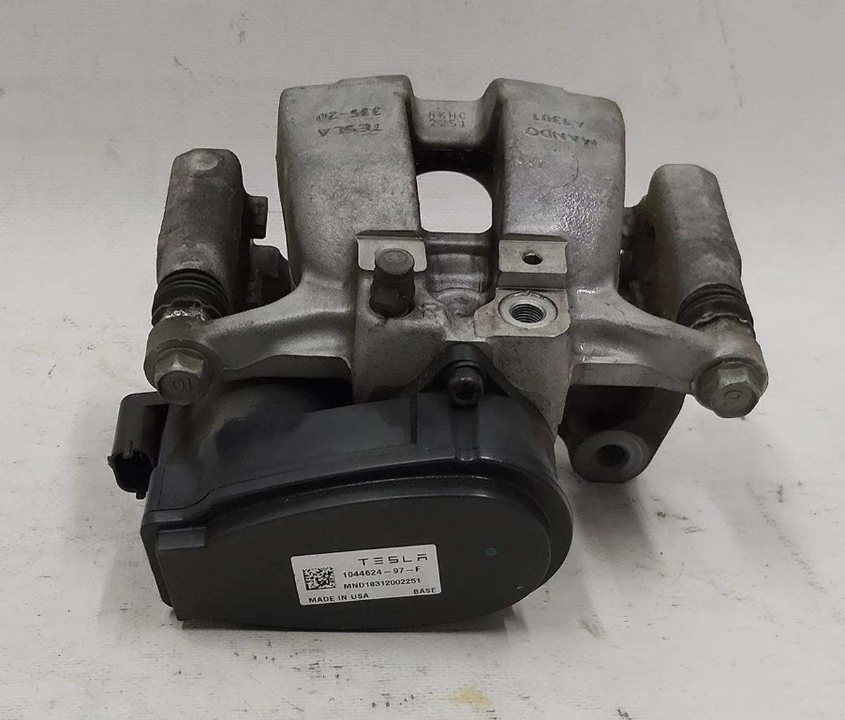 5 Brake caliper rear right MANDO without brake pads Tesla model 3 1044624-00-H