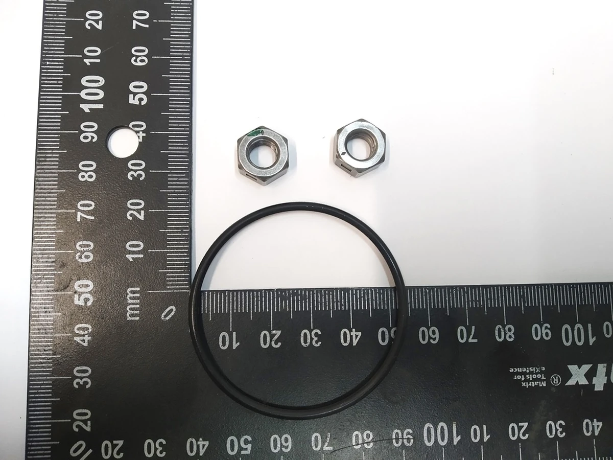 7 Сервісний комплект (кільце ущільнювача, 2 гайки) головного гальмівного циліндра Tesla model 3, model Y 1044676-00-B