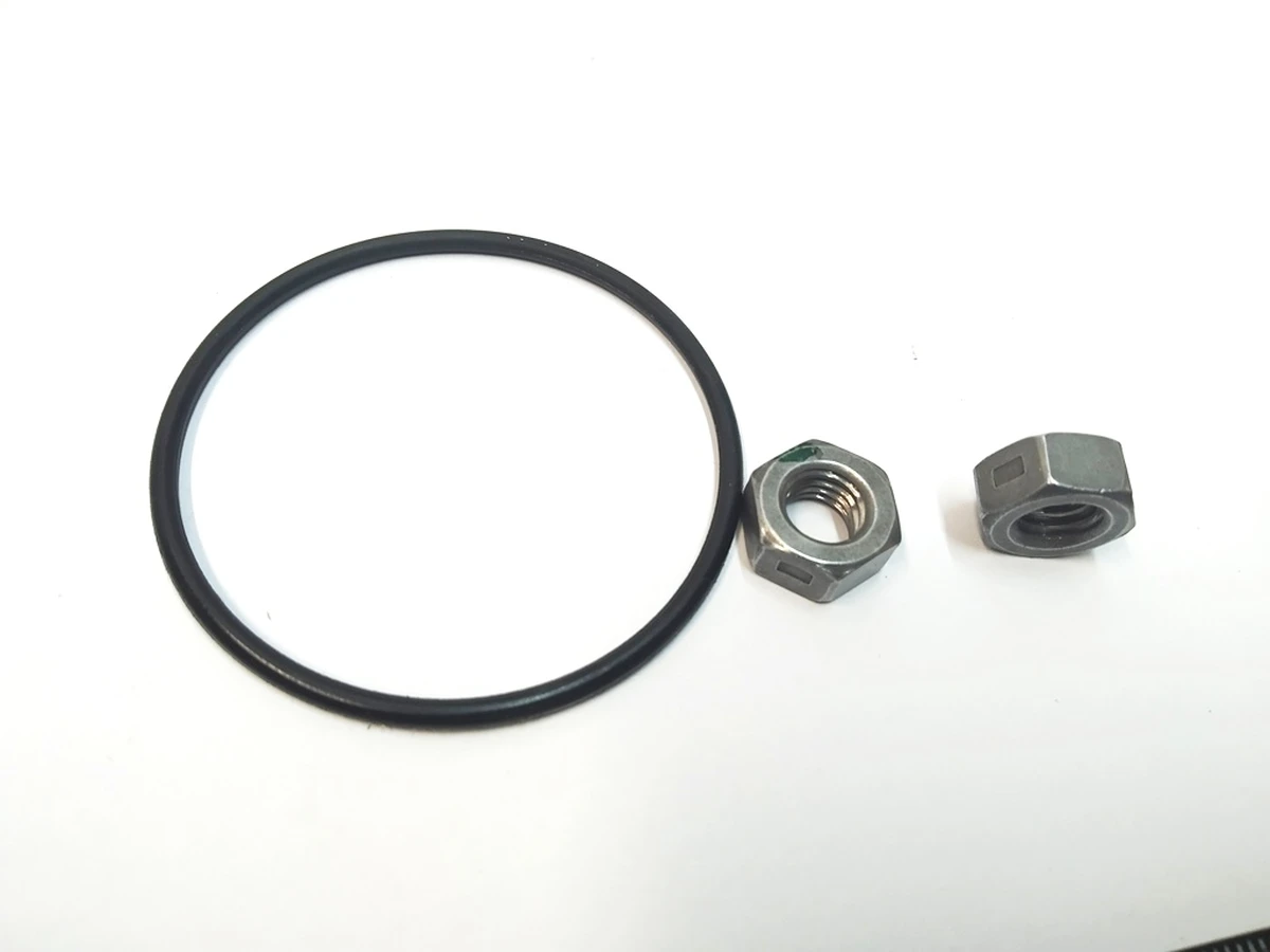 7 Сервісний комплект (кільце ущільнювача, 2 гайки) головного гальмівного циліндра Tesla model 3, model Y 1044676-00-B