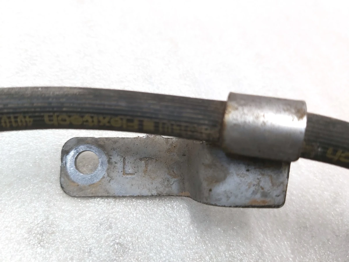 1 Brake hose bracket front left Assembly Tesla Model 3, Model 3 Jan 2024 1044721-00-D