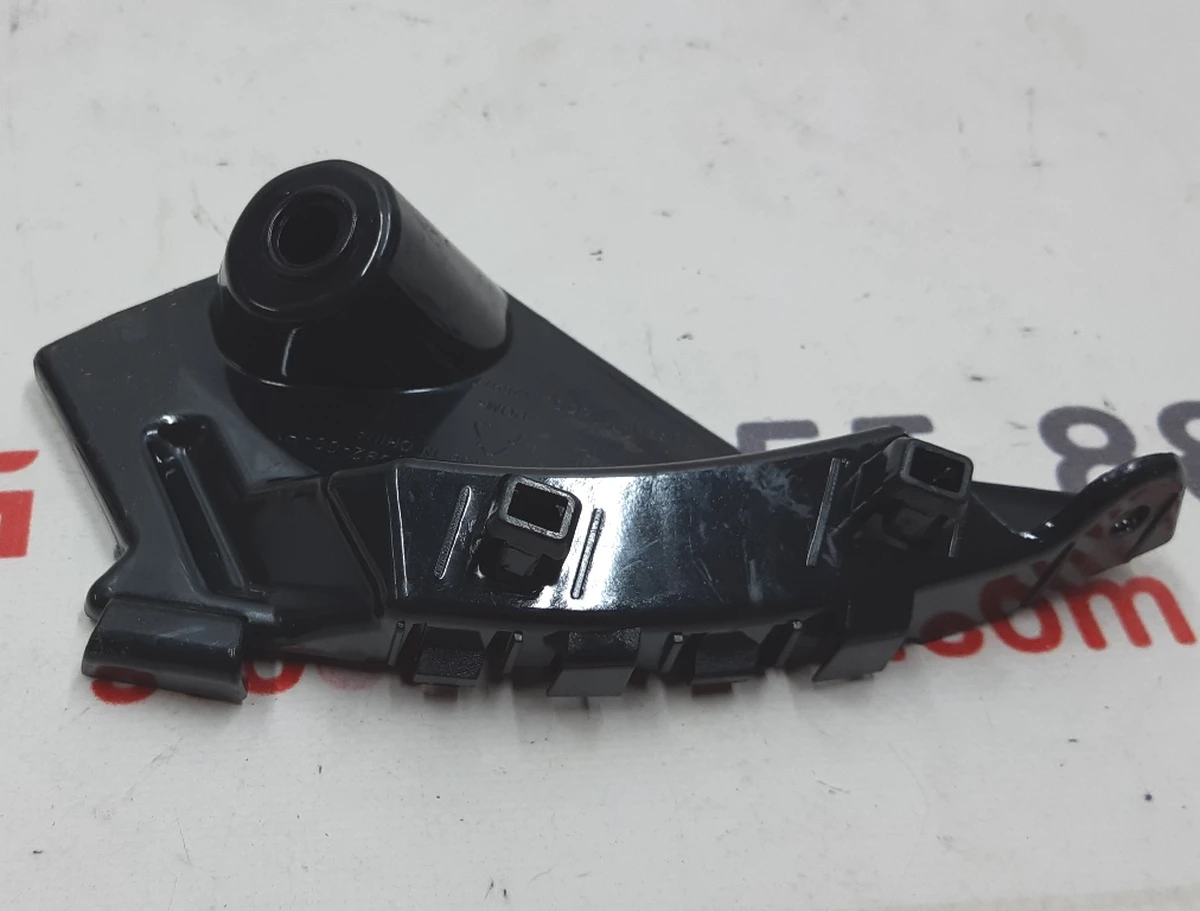 MX FASCIA FENDER BRKT LH NEW not original {MX} 1047092-00-H