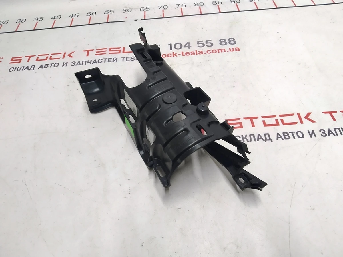 1 Bracket, door trim, upper front rear left hand Tesla Model X 1055048