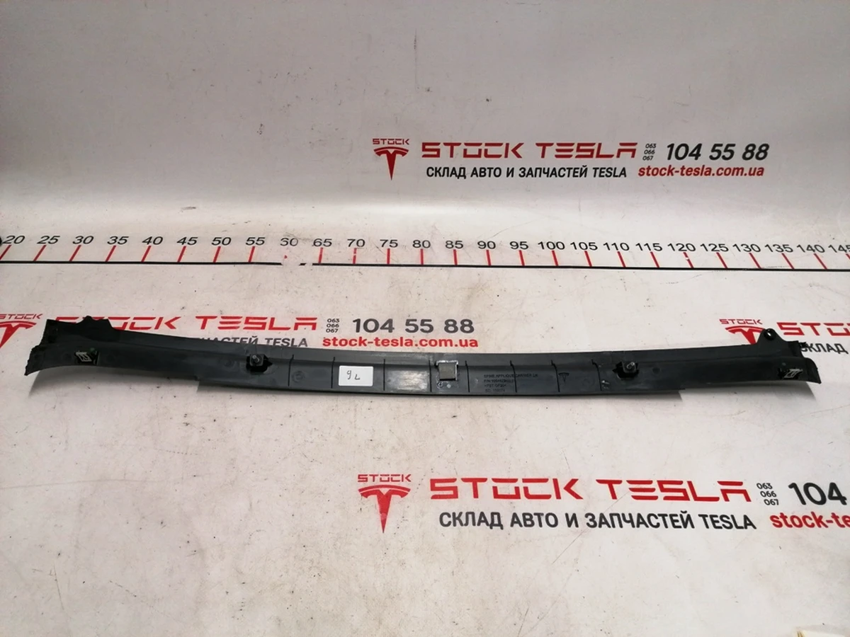 20 Assembly carrier MX center spine applique, LH Tesla Model X 1054829-99-F