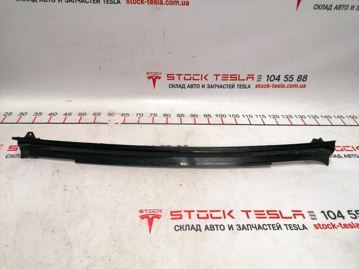 20 Assembly carrier MX center spine applique, LH Tesla Model X 1054829-99-F