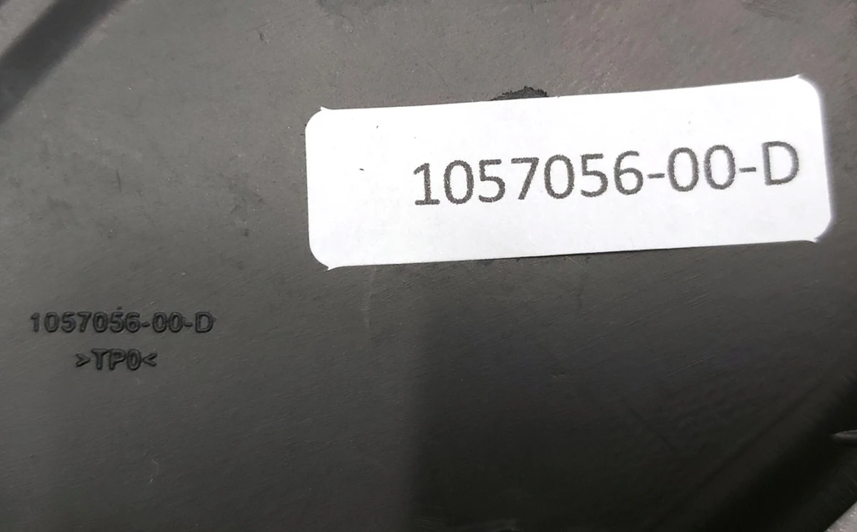 15 MX Front tow hook cover Tesla Model X 1057056-00-D