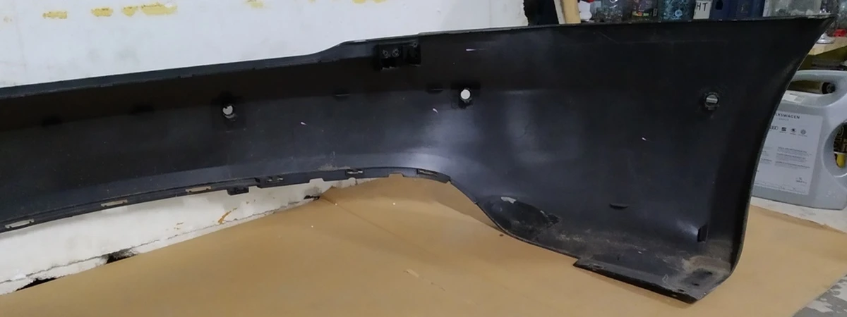 1 Бампер задний под 6 парктроников в сборе c кронш. креп. парктроников и кронш. бампера OBSIDIAN BLK (мелкие царапины) Tesla model S REST 1057319-S1-A