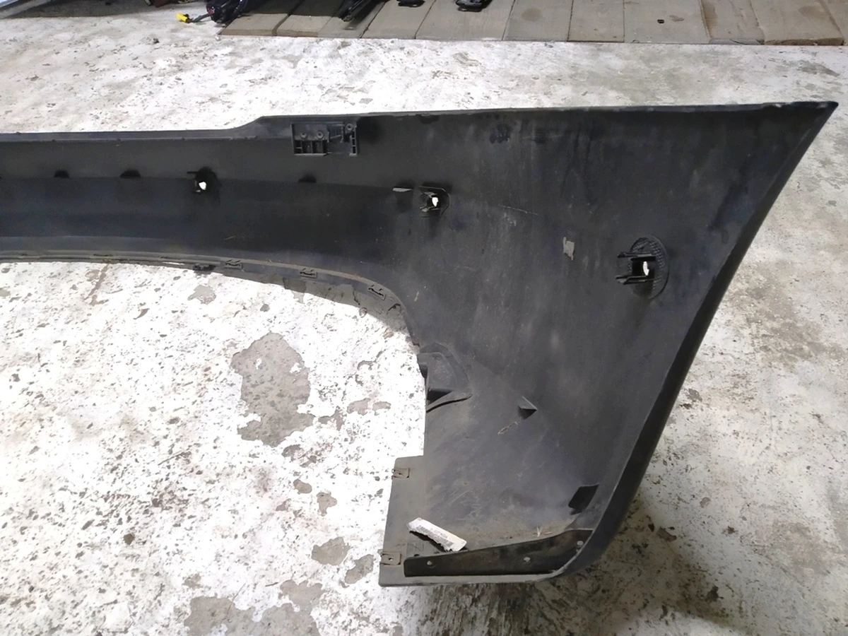 1 Бампер задній під 6 парктроників із кріпленнями парктроників PMNG (з пошкодженням) Tesla model S REST 1057319-01-B