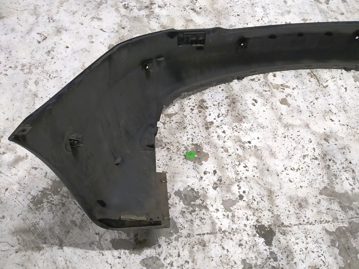 1 Бампер задній під 6 парктроників із кріпленнями парктроників PMNG (з пошкодженням) Tesla model S REST 1057319-01-B