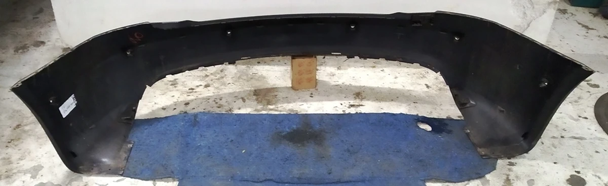 1 Бампер задній під 6 парктроників PMNG (з ушкодженнями) Tesla model S REST 1057319-S4-A