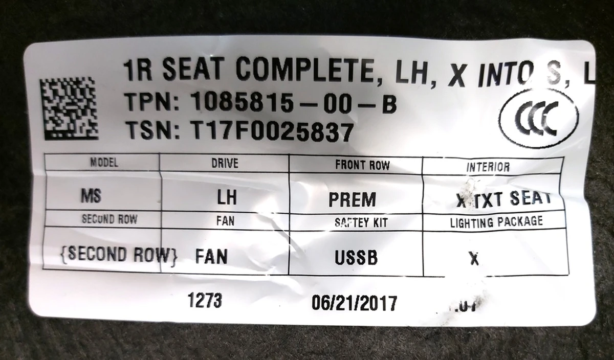 1 The trim on the bottom of the driver's seat TXT SEAT Tesla model  S REST 1454066-00-A