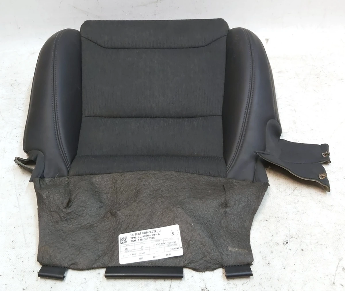 1 The trim on the bottom of the driver's seat TXT SEAT Tesla model  S REST 1454066-00-A