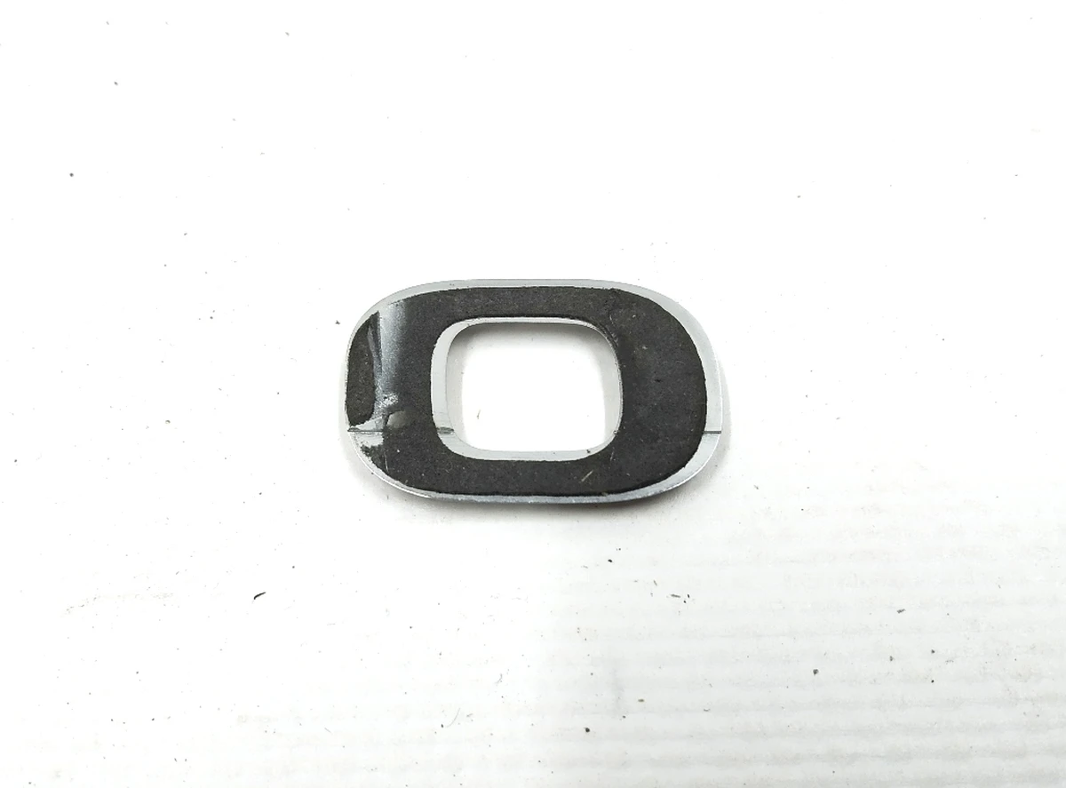 12 Емблема "0" кришки багажника Tesla model X 1066305-00-A