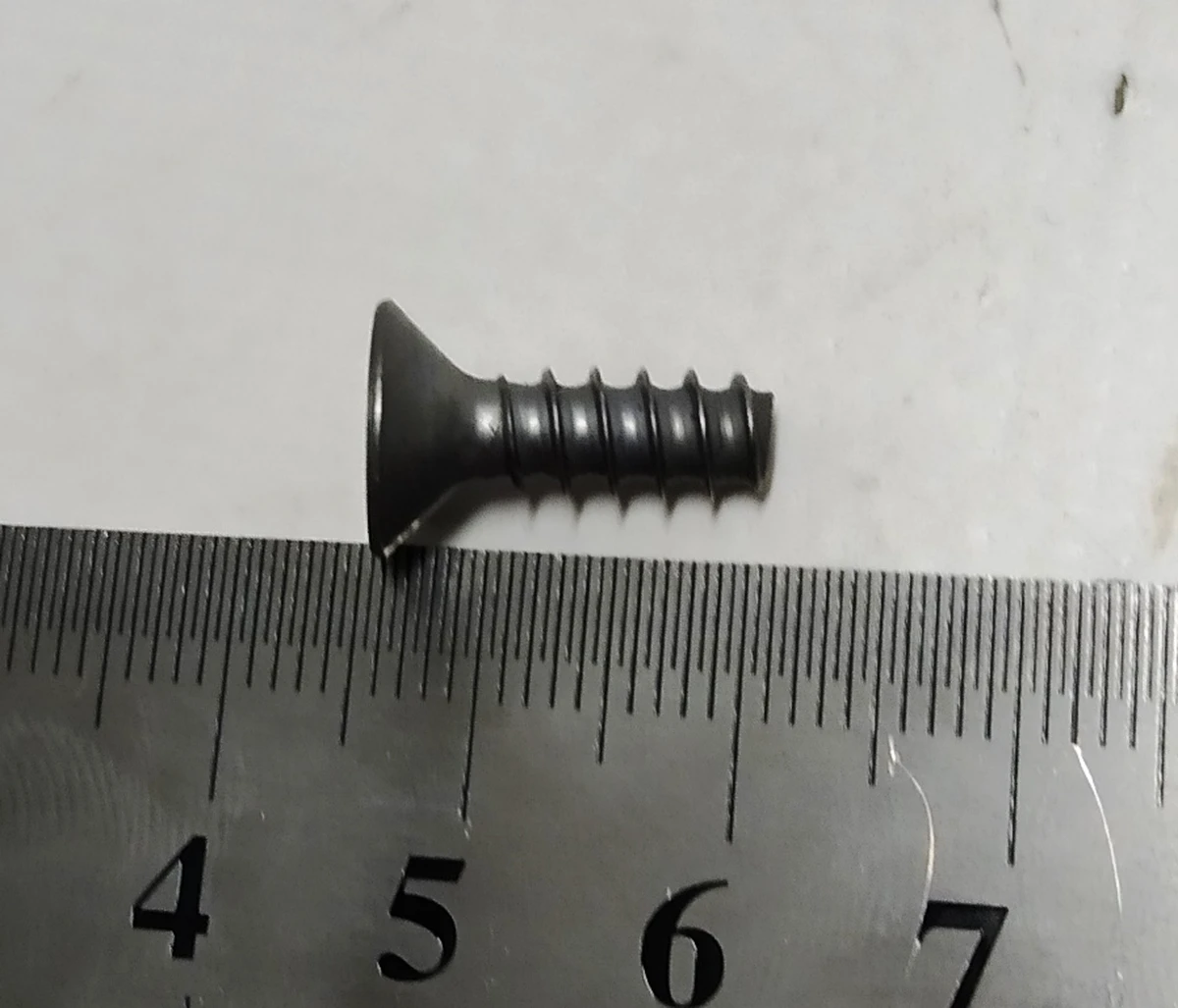 7 Гвинт задньої кришки механізму ручки зовнішньої SCREW,FC,50x15,STL,ZNNI,DELTAPT
