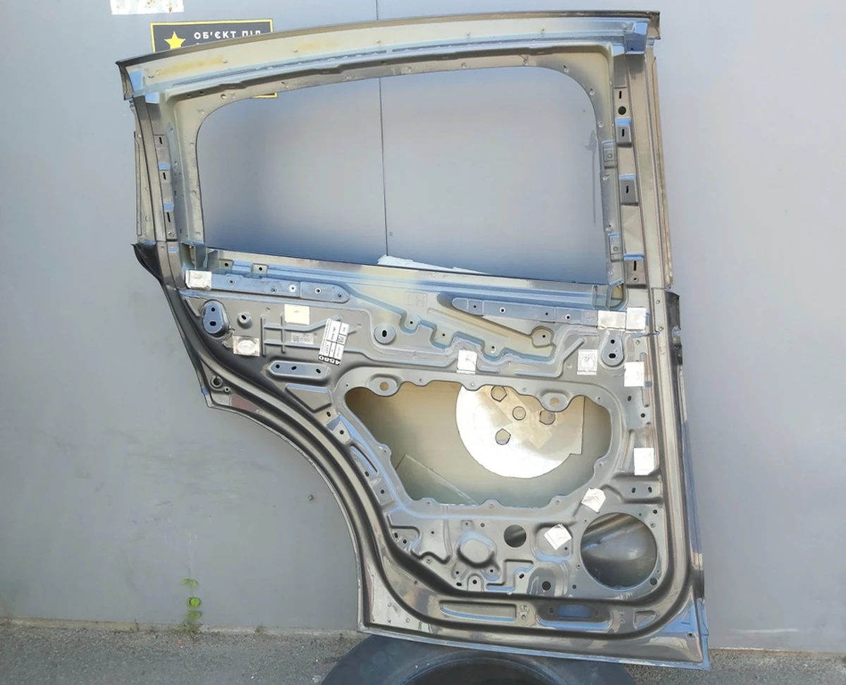 8 Двері задні ліві (метал) PMNG Tesla model X 1069537-12-A