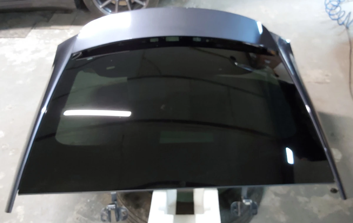 10 Кришка багажника (ляда) PMNG зі склом у частковому зборі з пошкодженням Tesla model X 1069546-E0-A