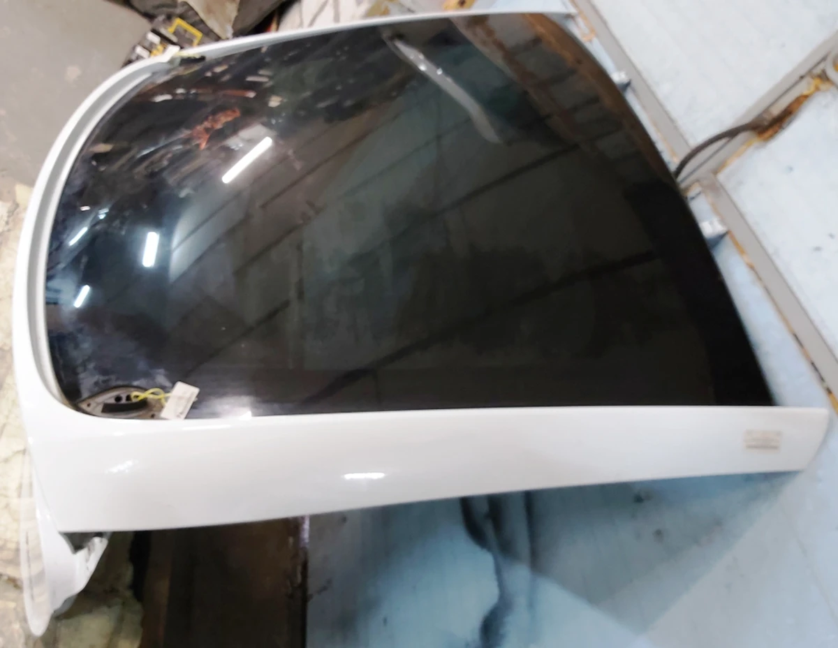 10 Trunk lid metal PPSW with glass partially assembled Tesla model X 1069546-E0-A