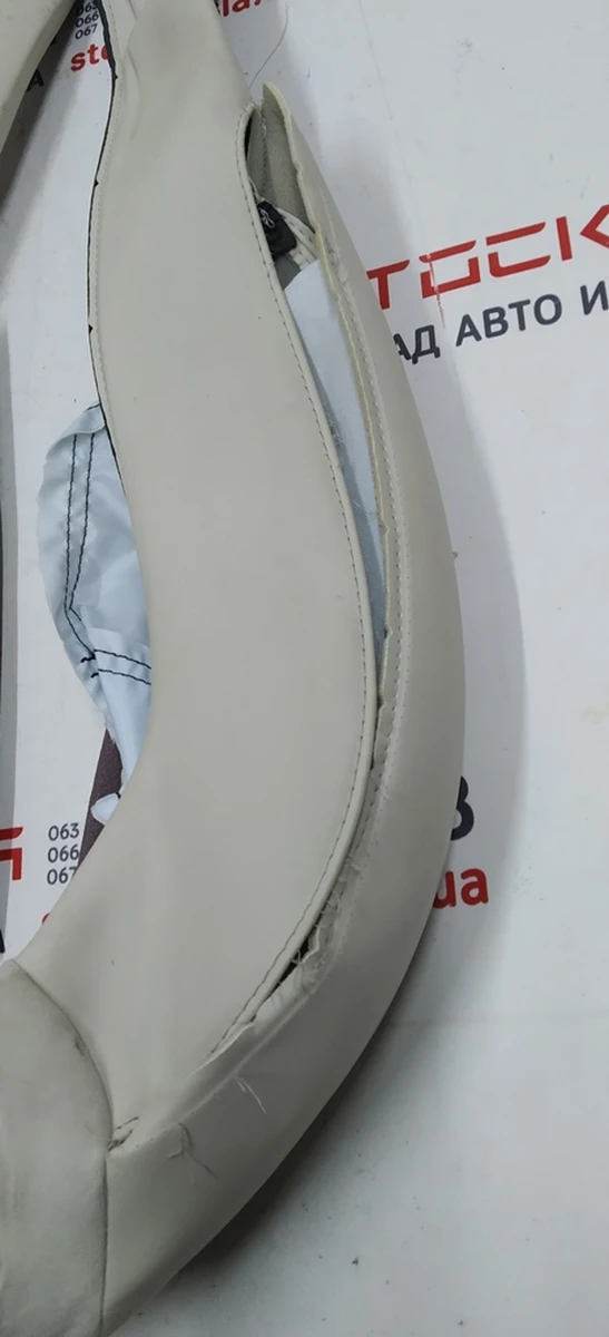 1 Обшивка бічної підтримки і кантика верхній частині пас. сид. PUR CRM (з пошкодженим) {MX_MSR} 9876524-03-A