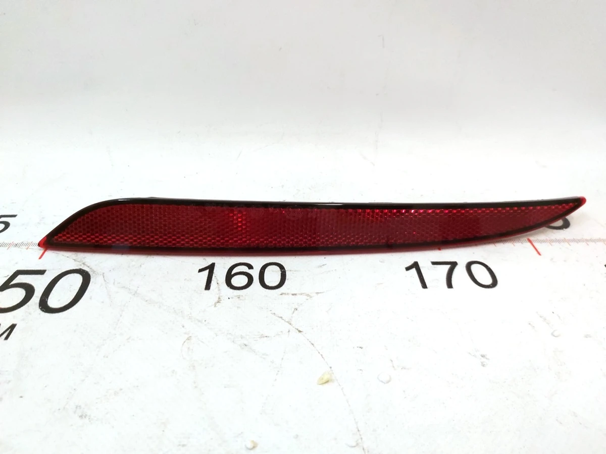 6 Відбивач заднього бампера лівий пасивний Tesla Model 3 1077406-00-F