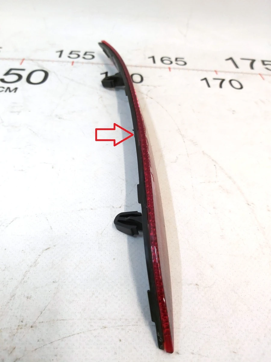 6 Відбивач заднього бампера лівий пасивний Tesla Model 3 1077406-00-F