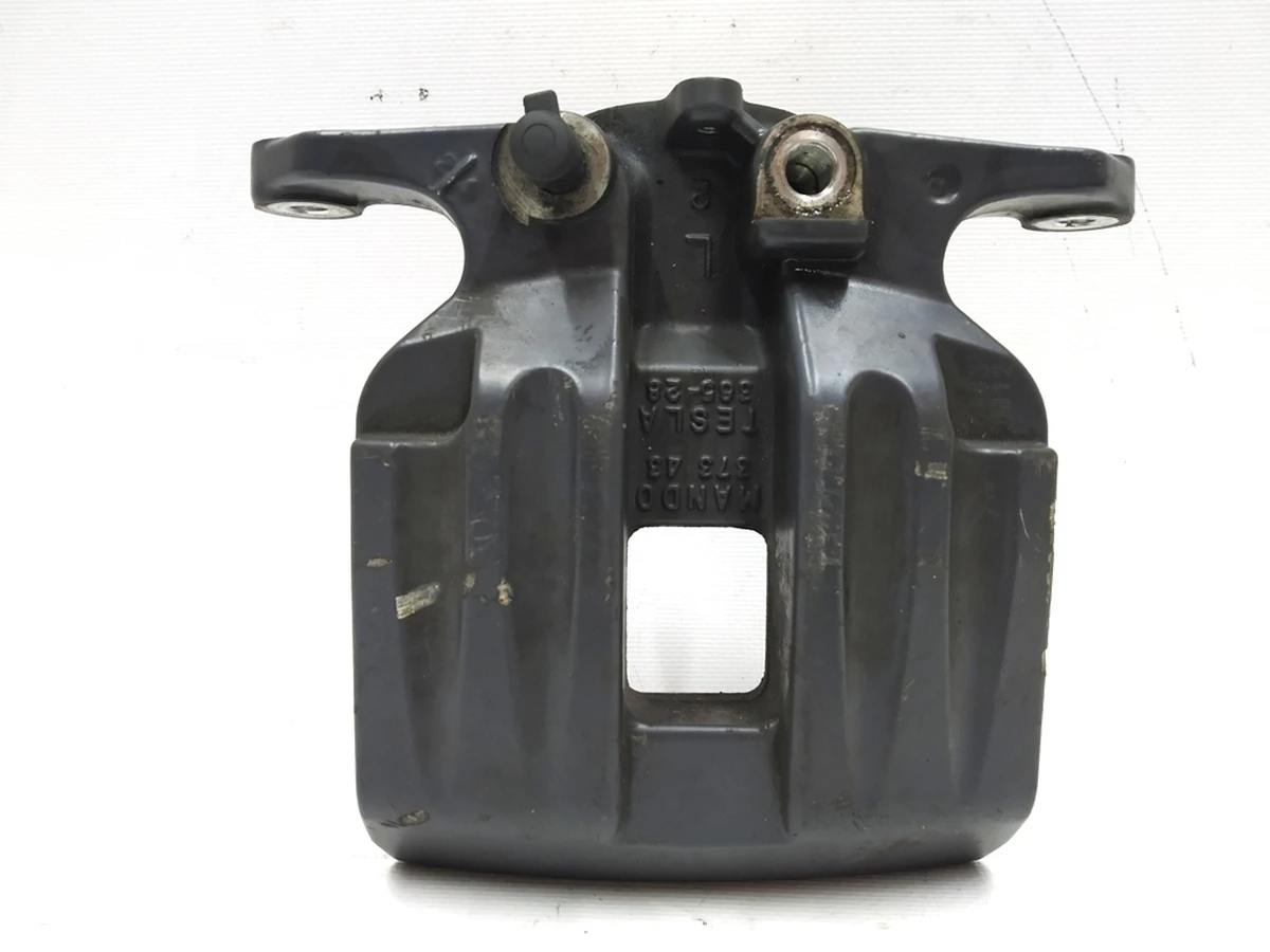 1 Частина верхня супорта гальмівного заднього лівий MANDO