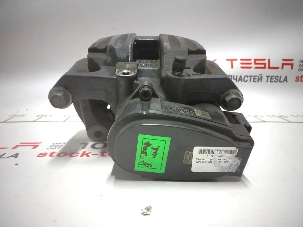 1 Суппорт тормозной задний левый MANDO без накладки TESLA Tesla model S REST, Tesla model X 1078541-00-B