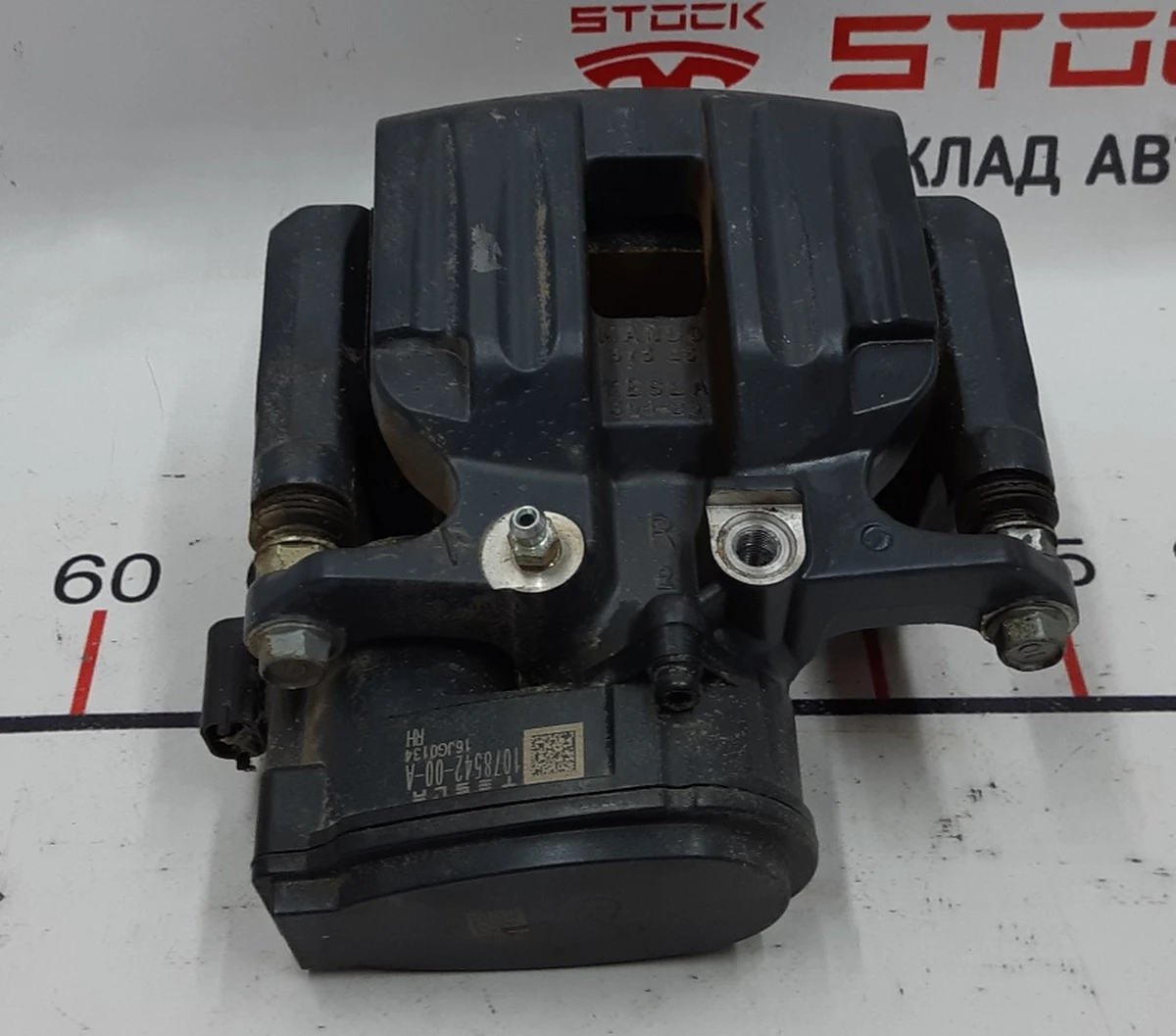 1 Супорт гальмівний задній правий MANDO без накладки