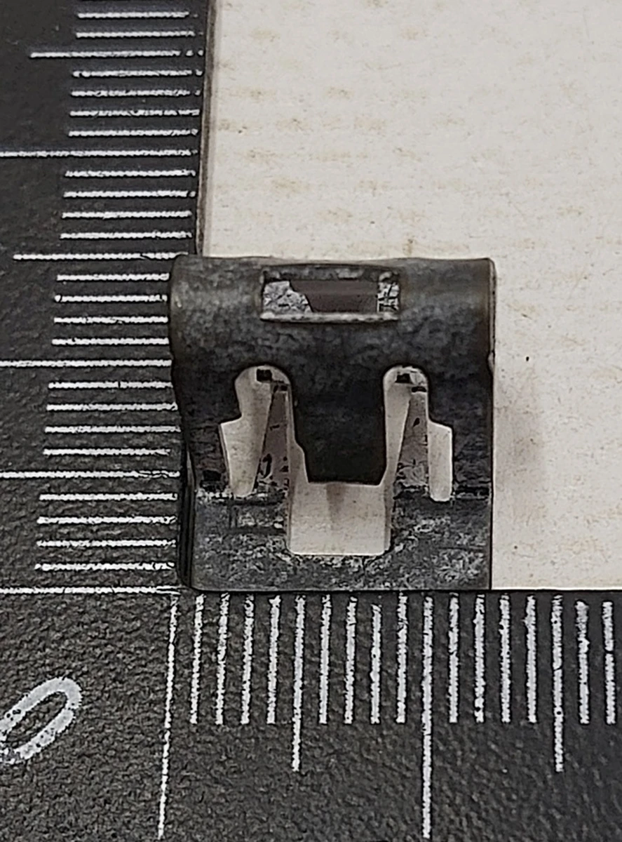 8 Clip metal trim for decorative passenger seat, lower left {MX_MSR} 1083456-00-A