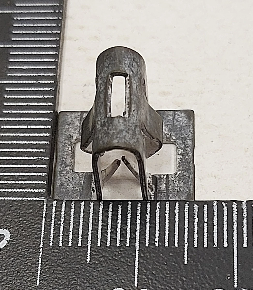 8 Clip metal trim for decorative passenger seat, lower left {MX_MSR} 1083456-00-A