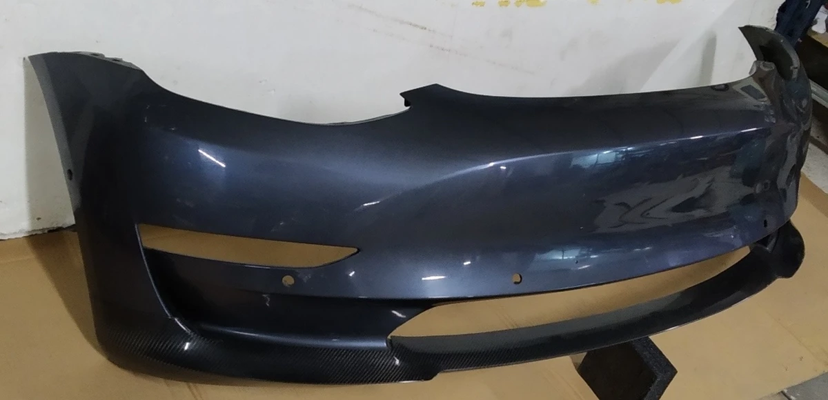 1 Бампер передний PMNG в сборе с кронш. креп. парктр., противотум. фар и подкрылков (тюнинг - карбоновая губа) (с повреж.) Tesla model 3 1084168-S4-E