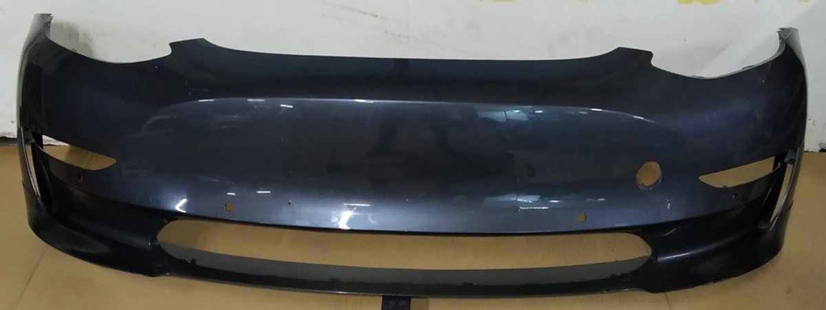 1 Бампер передний PMNG в сборе с кронш. креп. парктр., противотум. фар и подкрылков (тюнинг - карбоновая губа) (с повреж.) Tesla model 3 1084168-S4-E