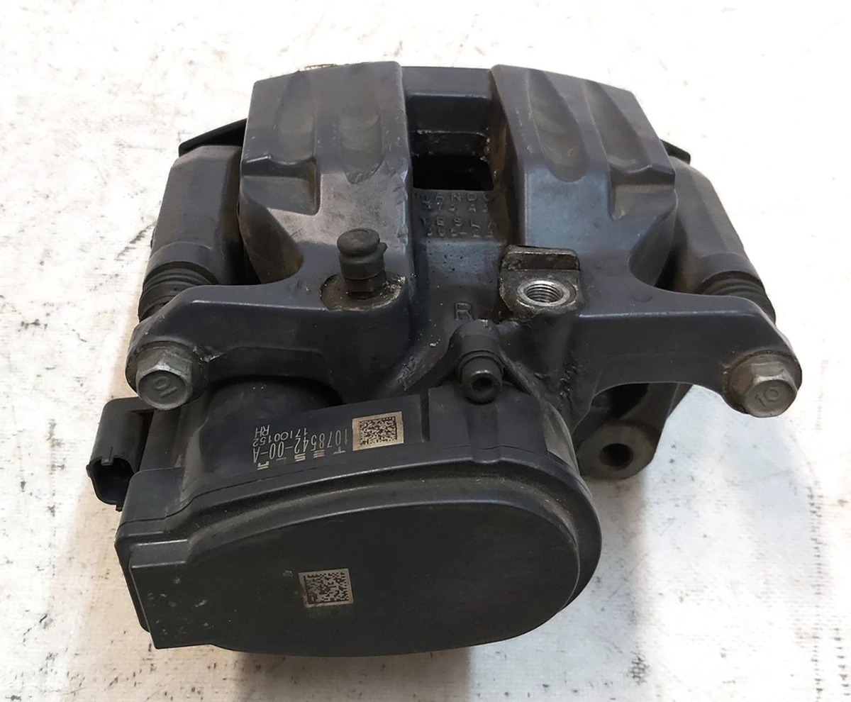 1 Супорт гальмівний задній правий MANDO без гальмівних колодок Tesla model S REST, model X 1078542-00-B