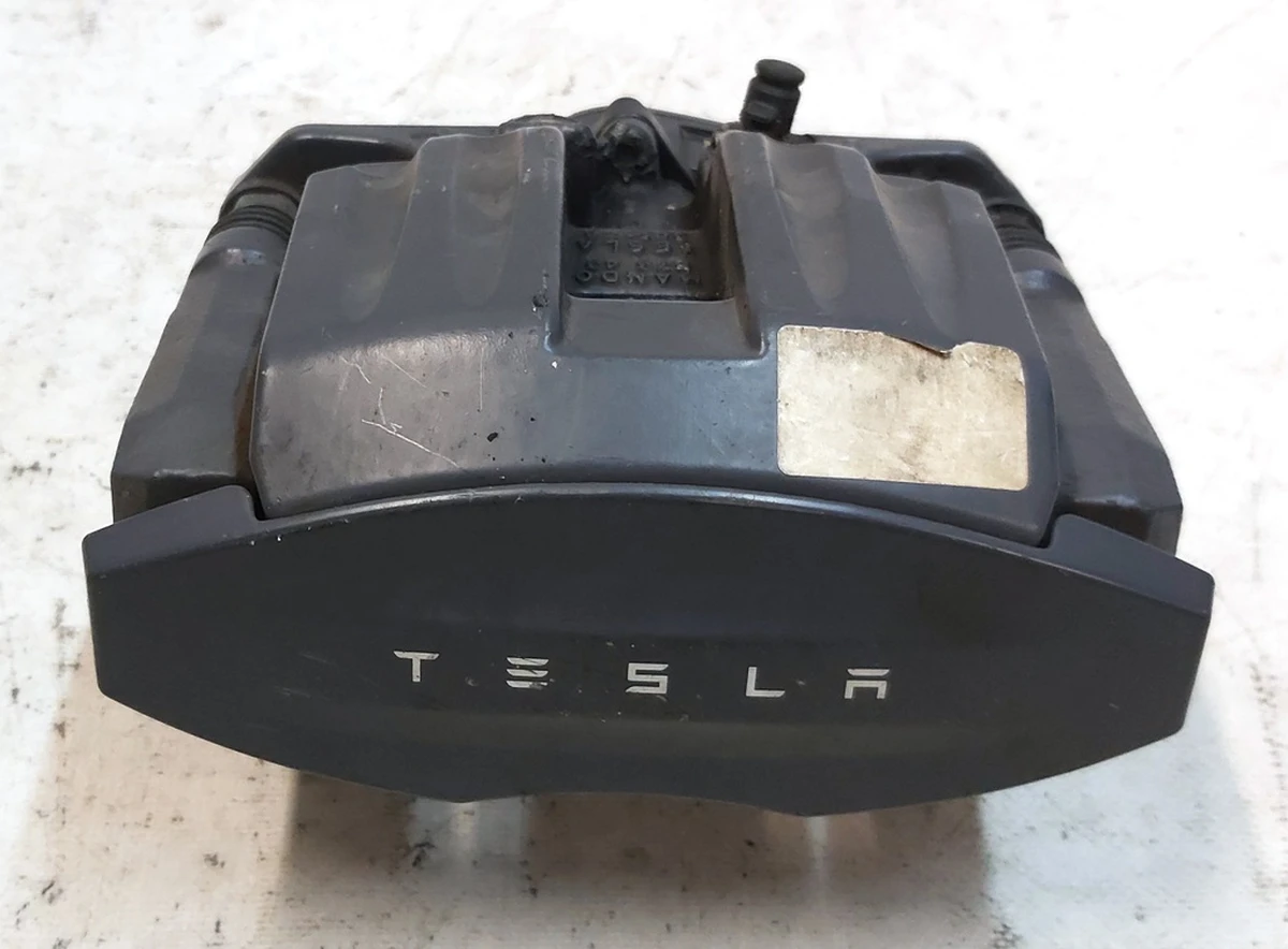 1 Супорт гальмівний задній правий MANDO без гальмівних колодок Tesla model S REST, model X 1078542-00-B