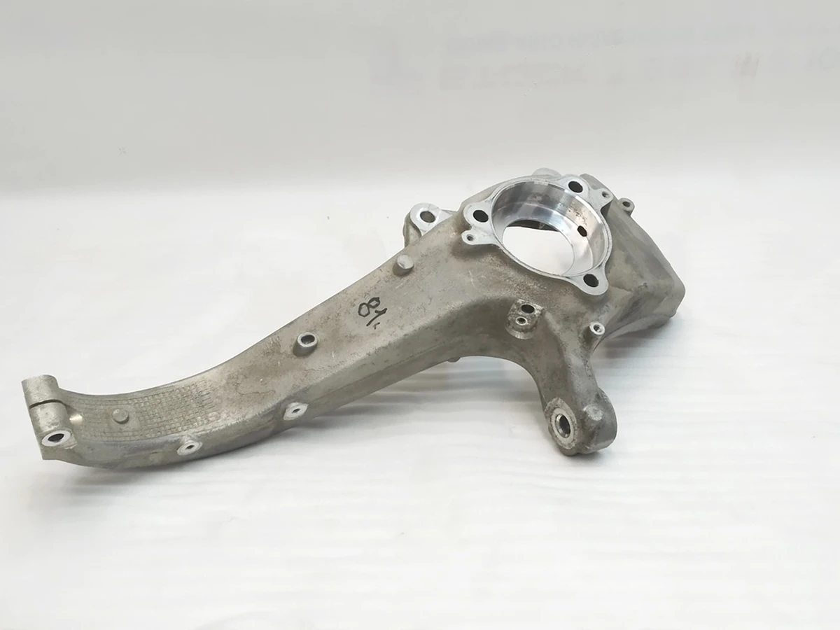 1 Front knuckle , LH  Tesla Model Y 1188311-00-E