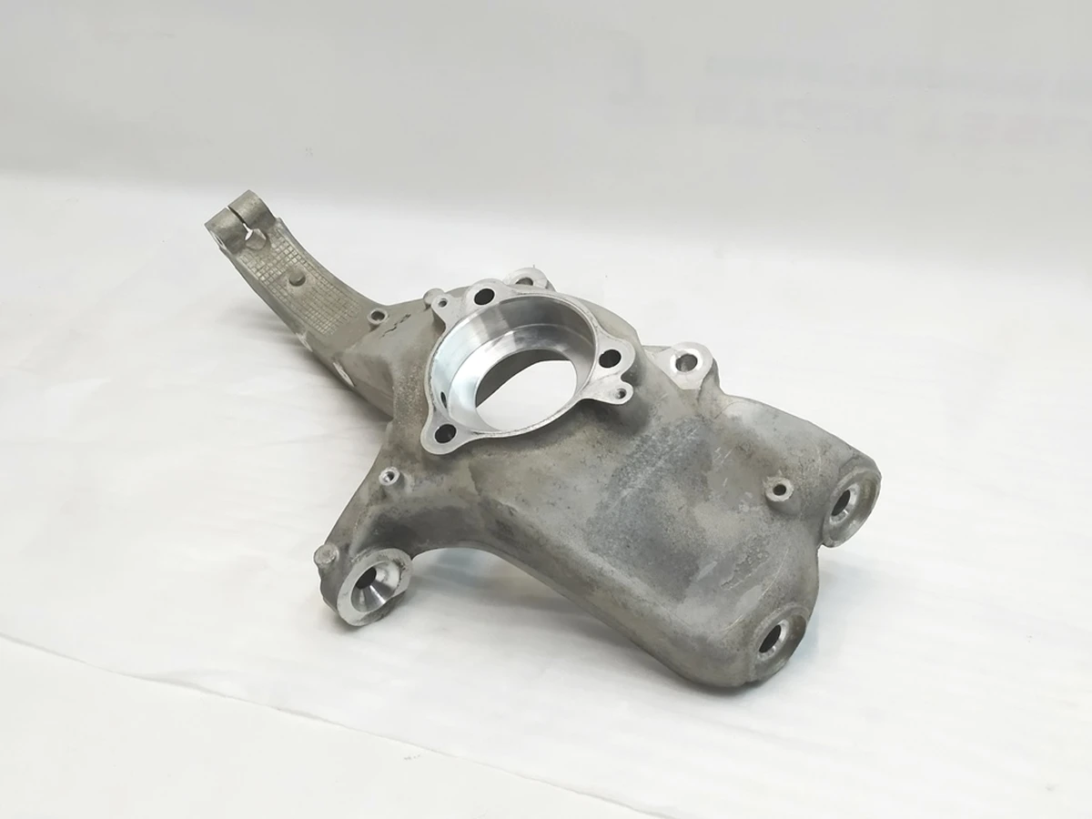 1 Front knuckle , LH  Tesla Model Y 1188311-00-E