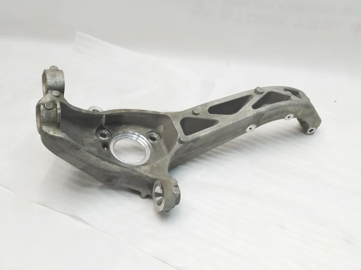 1 Front knuckle , LH  Tesla Model Y 1188311-00-E