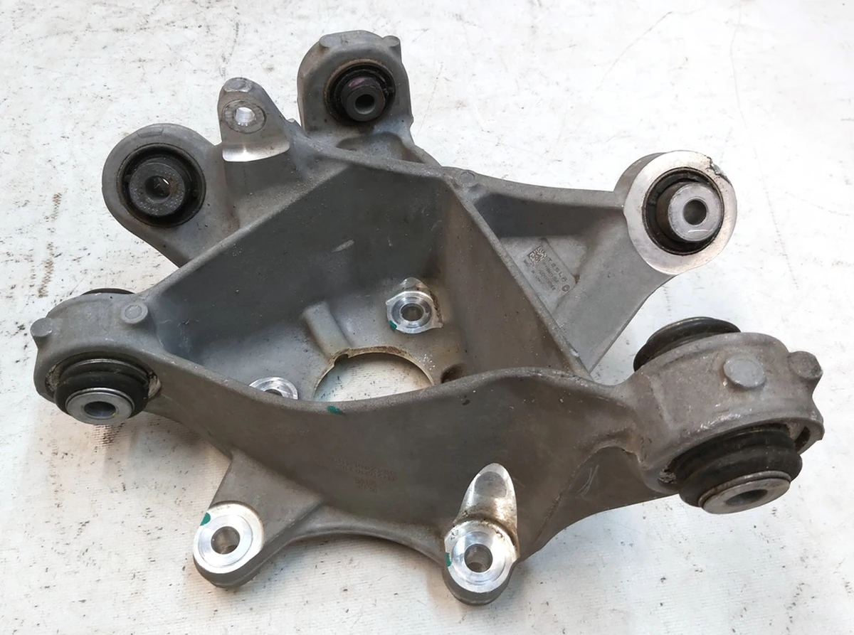 1 Кулак задній лівий (цапфа) Tesla model Y 1188411-00-F